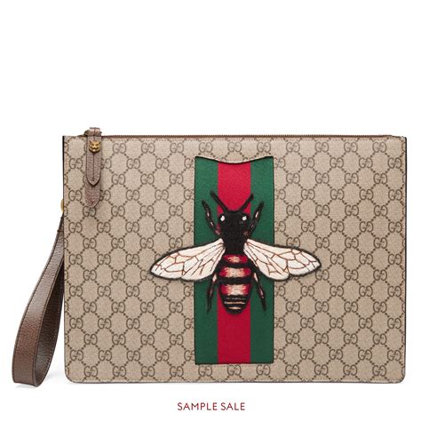 gucci bee supreme cross body|Gucci clutch bag.